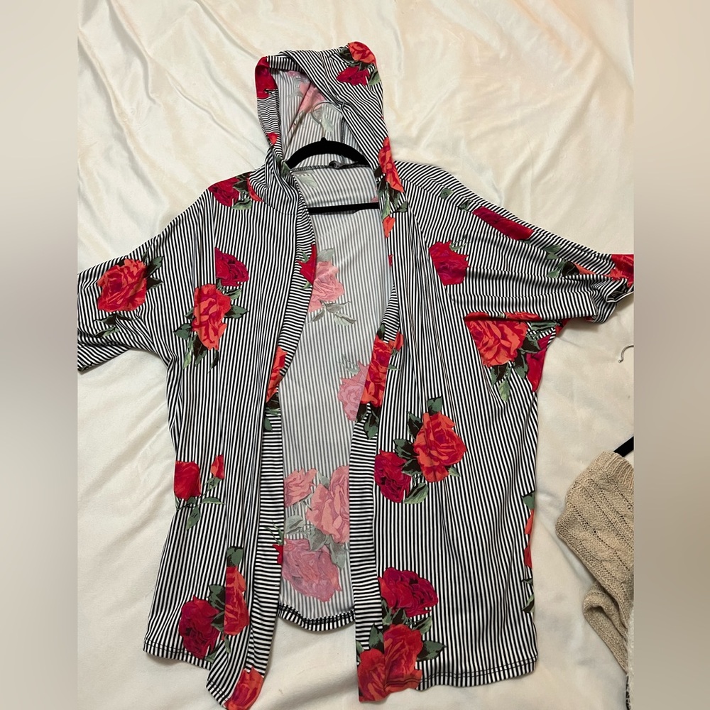 Super cute hooded beach cover up! One size fits most